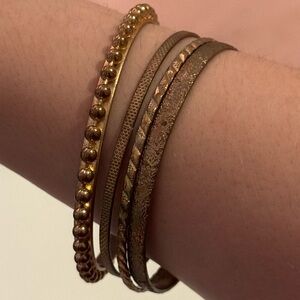 Set of 4 Gold tone bangle bracelets
